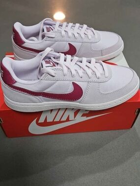 Nike White Sneakers with Pink Swoosh